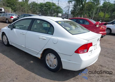 2007 Honda Civic Hybrid from USA, damaged, VIN JHMFA36257S023594